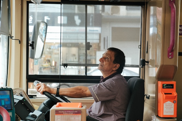 Professional driver at the wheel of a bus